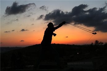 ISRAEL TROOPS KILL TWO PALESTINIAN SUSPECTS IN TEENS MURDER