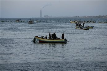 ISRAELI BOATS OPEN FIRE AT GAZA FISHERMEN