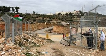 ACTIVISTS TEAR DOWN SETTLEMENT GATE SOUTH OF BETHLEHEM