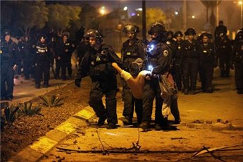 PALESTINIANS IN ISRAEL DECLARE NATIONAL STRIKE AFTER POLICE DEATHS