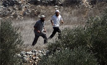 SETTLER SHOOTS PALESTINIAN IN VILLAGE SOUTH OF HEBRON