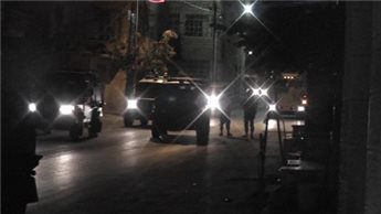 ISRAELI TROOPS ARREST TWO PALESTINIANS NEAR NABLUS