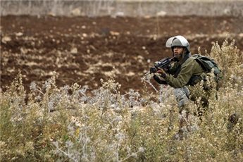 ISRAELI FORCES OPEN FIRE AT PALESTINIANS ACROSS GAZA BORDER