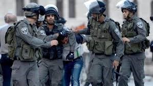 IOF ARRESTS PALESTINIAN, CLOSES ROAD IN AL-KHALIL