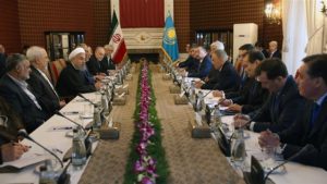 Iranian President Hassan Rouhani (3rd L) and his Kazakh counterpart Nursultan Nazarbayev (5th R) attend a meeting of high-ranking delegations of Iran and Kazakhstan in Tehran on April 11, 2016.
