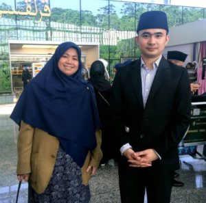 Qariah Siti Huzzaimah Yadey Hj Rosli (L) and Ak Mohd Adibul Amin Pg Hj Marjuki pose for a photo before their departure to the 58th International Tilawah Al-Quran Competition in Kuala Lumpur. 