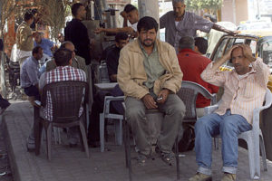 Unemployed Palestinians spend the day sitting in a cafe. As long as the economy in Gaza is not revived, unemployment will remain high and people will have little purchasing.