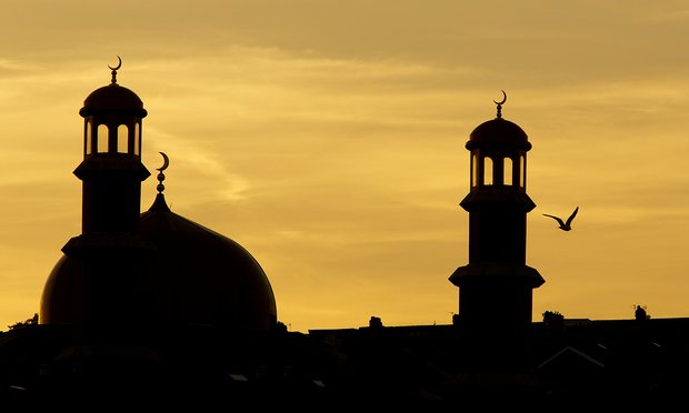 The minarets of the Masjid E Tauheedul in Blackburn, UK. During Ramadan, Muslims fast between sunrise and sunset.