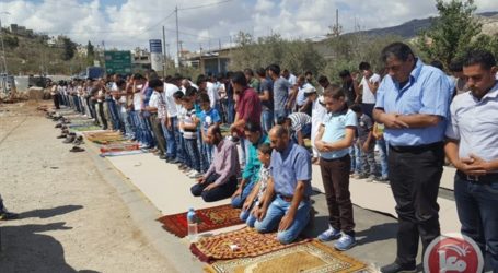 Palestinians Perform Friday Prayers at Beita Entrance to Protest Road Closures