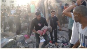 Israel's killing of 100 Civilians on Gaza School (Photo; Wafa)