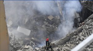 Teams work on the scene after an Israeli airstrike targets a multi-story building in the Bachoura neighborhood of the Lebanese capital, Beirut on March 18, 2026.(Photo: Anadolu Agency)