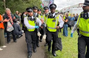 Security forces take measures as protesters gather outside Woolwich Crown Court to show support for a group known as the “Filton 24,” whose trial is ongoing over a protest at an Israeli defense company’s facility in Bristol in 2024 in London, United Kingdom on June 12, 2026. [Aysu Biçer – Anadolu Agency]